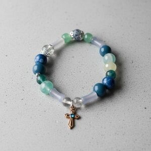Elegant Beaded Bracelet with Cross Charm